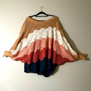 Scalloped oversized knit sweater with dropped sleeves
